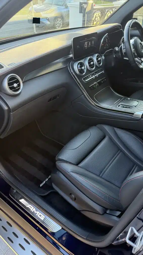 Clean Mercedes dashboard and passenger cabin after a full detail.